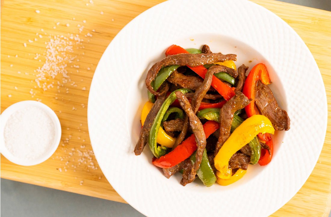 Rindfleischstreifen mit Paprika und Wildreis